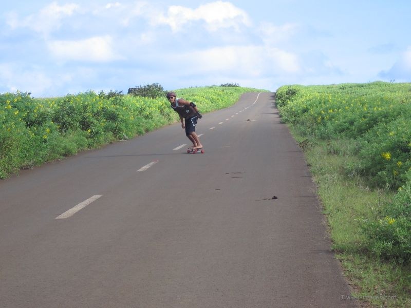 skateboarder man road